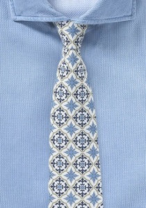 Corbata azul, dorada y blanca con un diseño