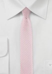 Corbata estrecha rosa con un motivo de lunares