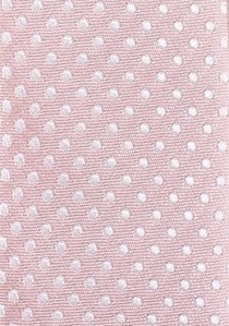 Corbata estrecha rosa con un motivo de lunares